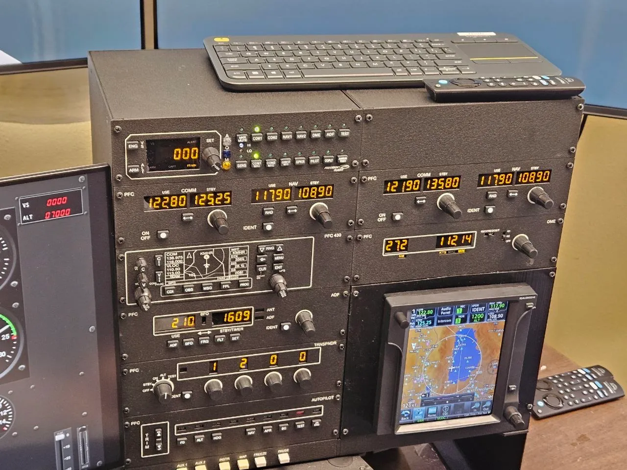 Student training with instructor at NV Flight’s simulator