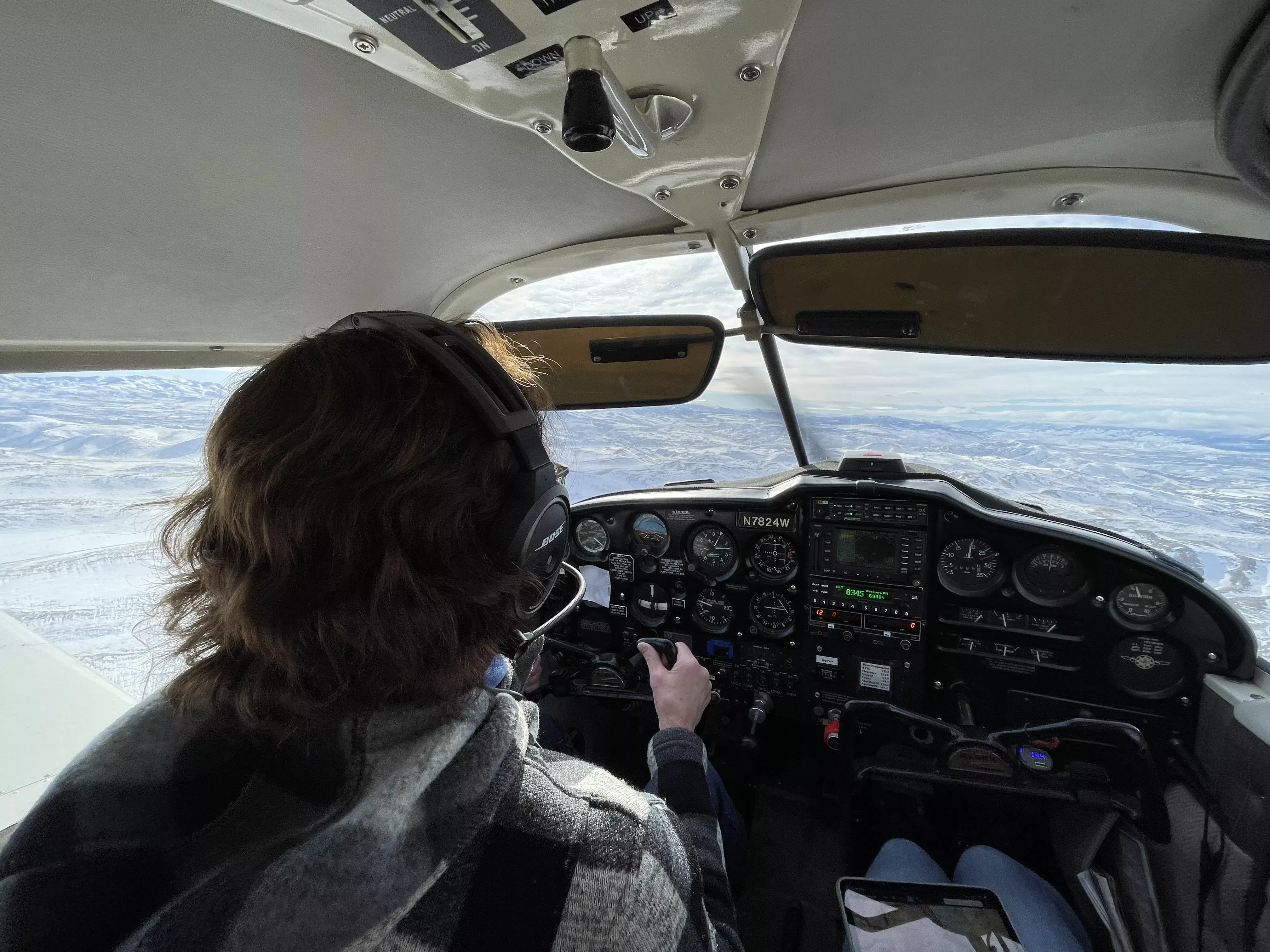 Instructor guiding a student during a preflight inspection
