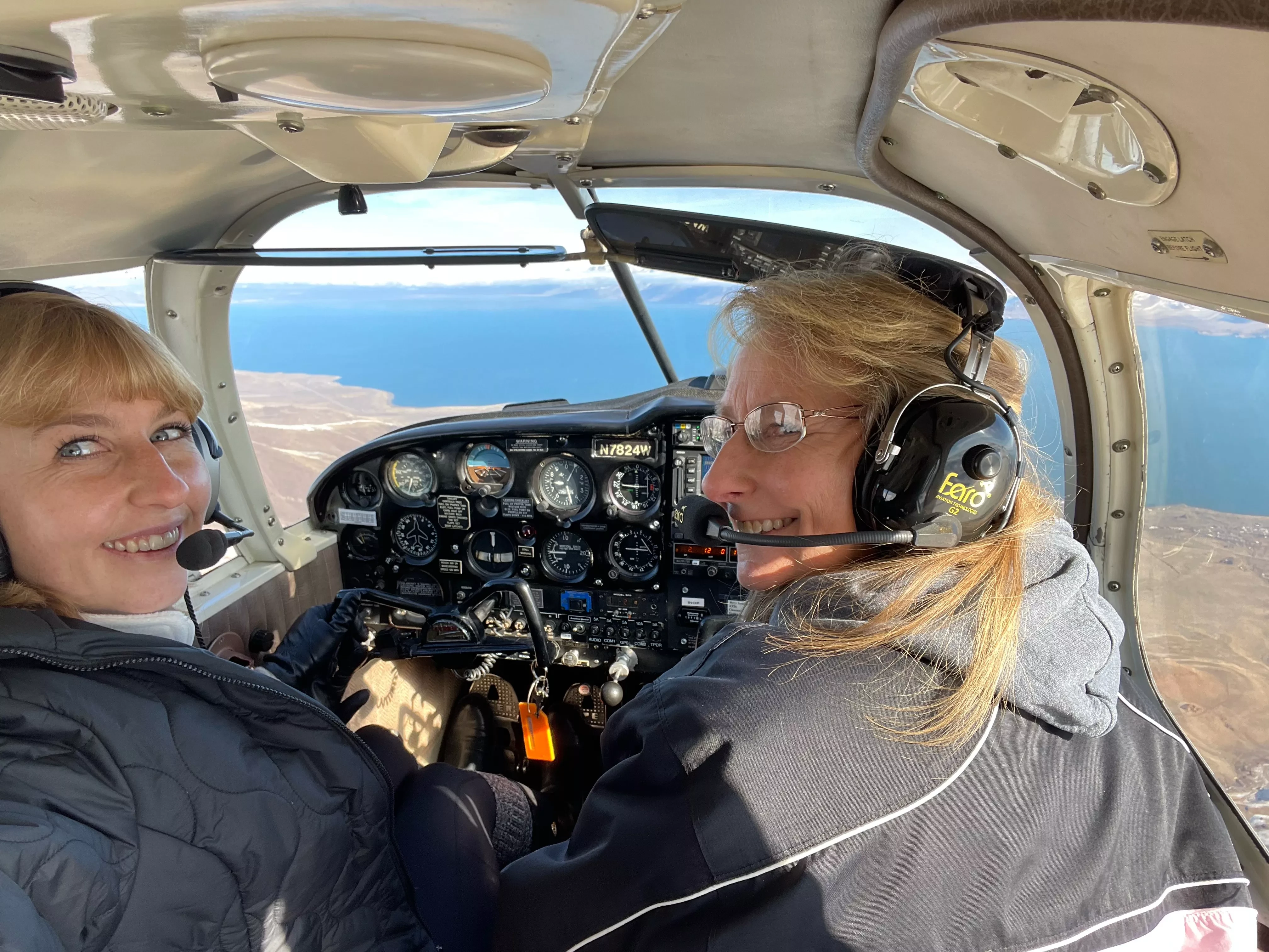 Instructor and student working on instrument approach charts